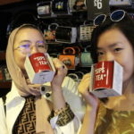 Exeter College Summer Programme Students in a souvenir shop
