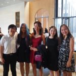 Exeter College Summer Programme Students smiling in Cohen Quad at a formal