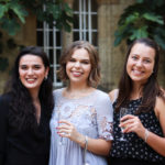 Exeter College Summer Programme Student smiling in Fellows Garden at a Formal
